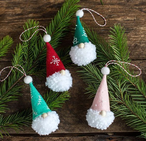 little gnome Christmas ornaments of pompoms, colorful cones and beads on top for a fun touch