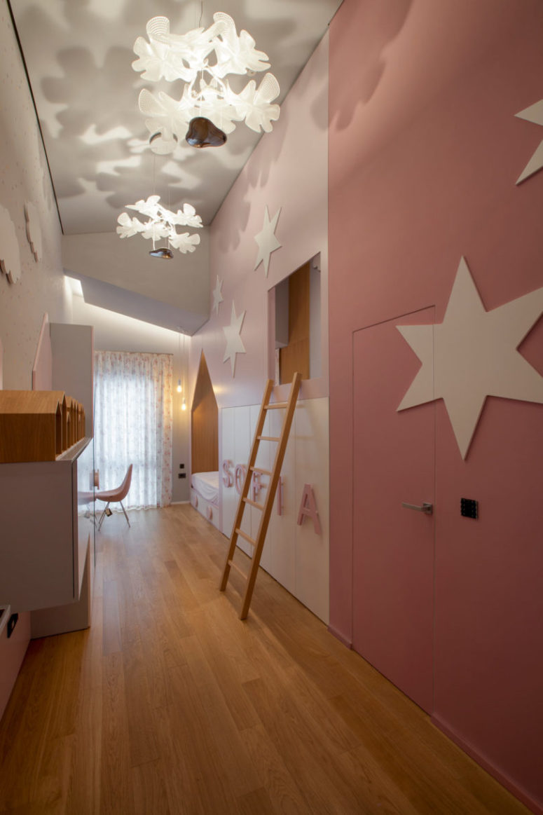 The kid's room is done in pink and white, though it's rather long and narrow, there's everything necessary The kid's room is done in pink and white, though it's rather long and narrow, there's everything necessary