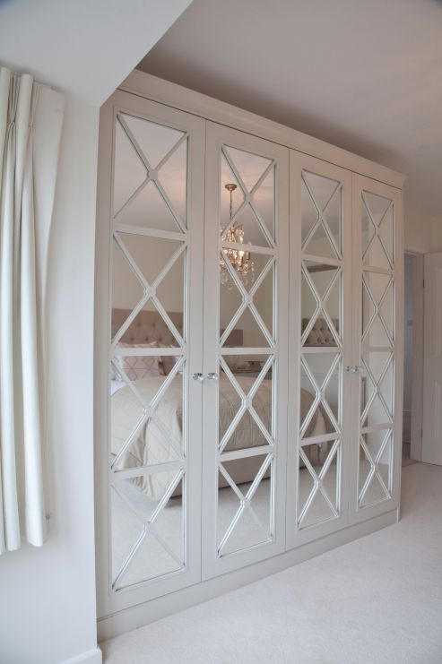 a chic refined wardrobe with cross framing is ideal for a girlish or vintage-inspired bedroom