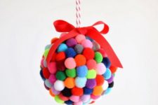 12 a colorful small pompom ornament with a bow on top is a fun idea to decorate your Christmas tree
