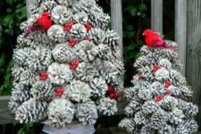 15 snowy pinecone Christmas trees in cool snowflake pots, fake red berries and birds are amazing for porch decor