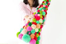18 a bright and colorful pompom Christmas tree with a neon bow on top is a gorgeous idea for those who love colors