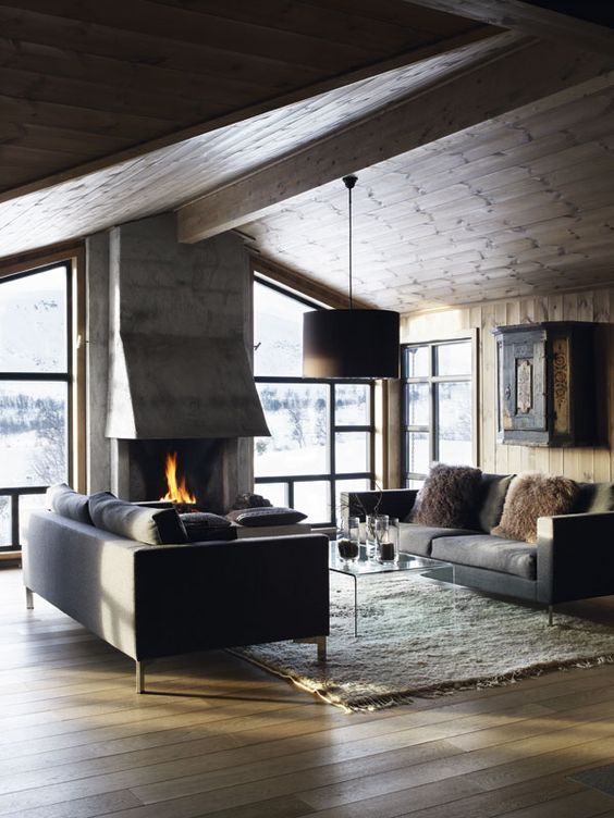 a modern chalet is an ideal example of a modern rustic space, done with wood, fur and stone