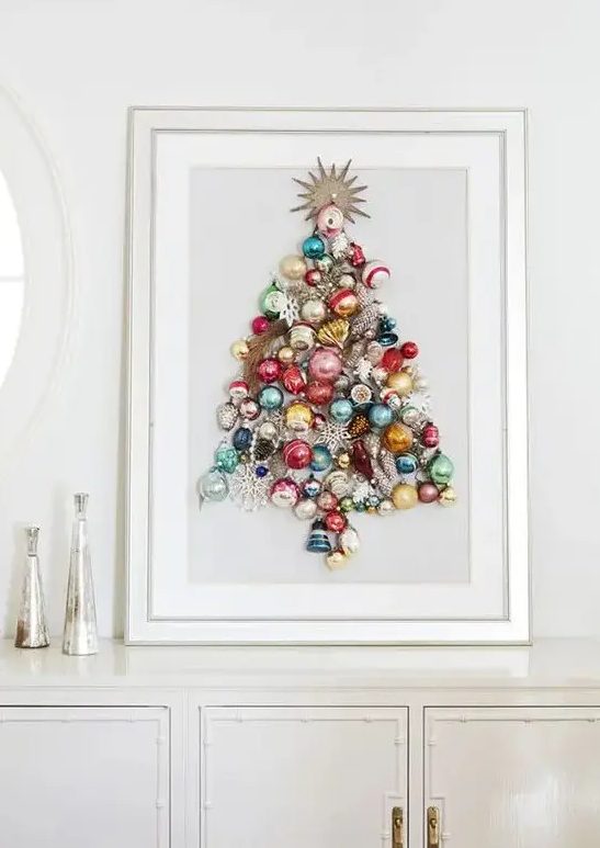 a beautiful colorful Christmas tree made of ornaments on a sign is a chic idea of an additional Christmas tree