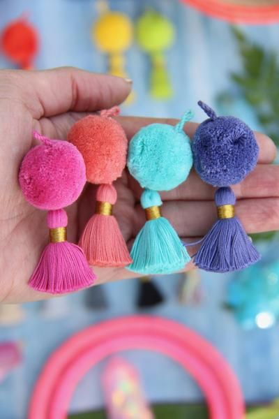 colorful pompom and tassel Christmas ornaments will be nice decor for the holidays, you can put them wherever you want