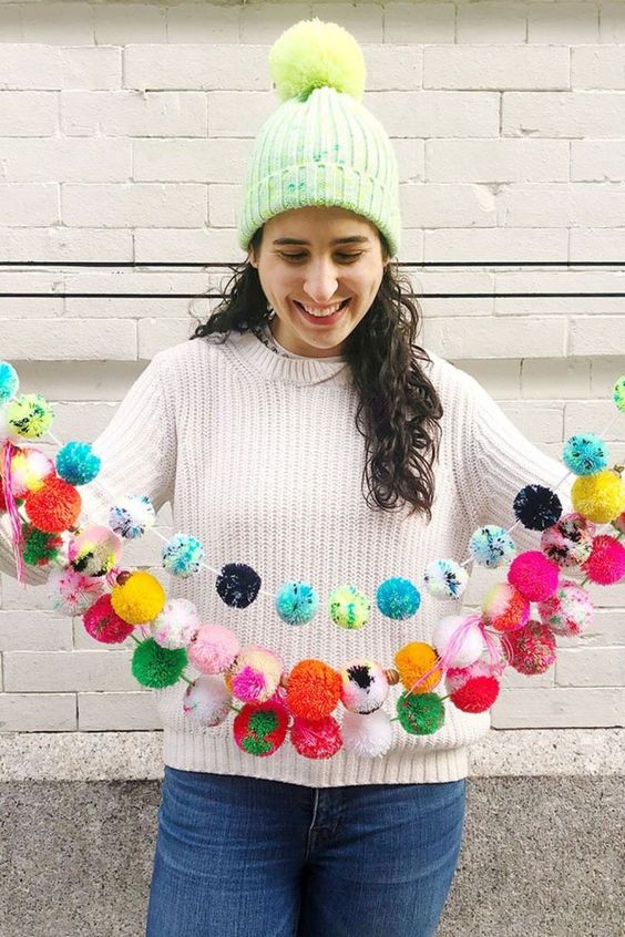 super colorful pompom Christmas garlands are amazing for styling a Christmas tree, mantel, stairs or any other space