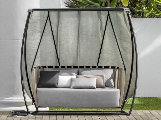 great swing for an outdoor space There are various wood finishes and various types and colors of fabric to fit every outdoor space