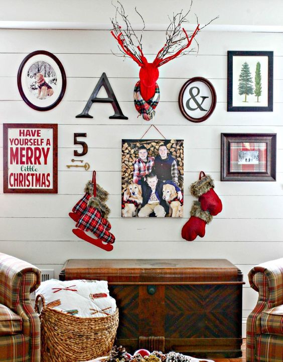 a colorful gallery wall with photos, signs, ice skates, a fake feer head and letters for Christmas