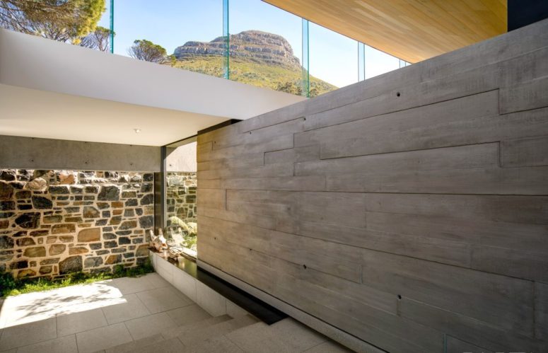 The clerestory windows which frame the upper floor allow natural light and views of the sky and the nearby mountains inside the house The clerestory windows which frame the upper floor allow natural light and views of the sky and the nearby mountains inside the house