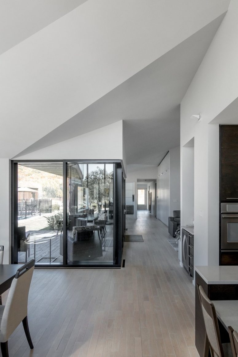 The color palette is natural and light, the decor is mostly about neutrals but a bit of drama is added with dark shades The color palette is natural and light, the decor is mostly about neutrals but a bit of drama is added with dark shades