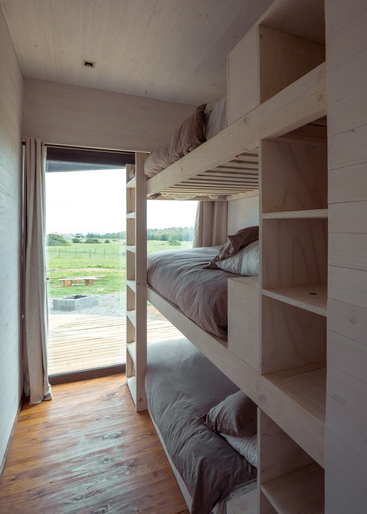 The guest room features three beds to accommodate as many guests as possible