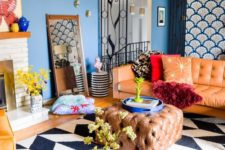 06 a colorful eclectic living room with modern furniture and textiles and touches of vintage