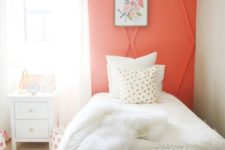 06 a coral architectural wall raises the guest bedroom decor to a new level and makes a colorful statement