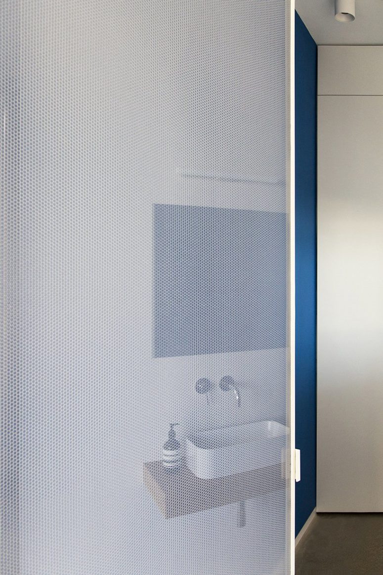 floating vanity is practical solution for any bathroom The bathroom is done with a floating vanity, a mirror, a shower