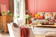 08 coral walls give a vivacious tone to the living room and make it bright, if you are ready for much color, go repaint the walls