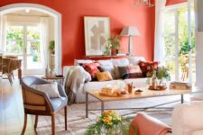 09 a coral statement wall brightens up and refeshes a neutral living room, a couple of matching textiles echo with it