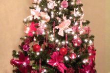 10 a fun and bold Christmas tree with ornments from pearl and silver to pink, hot pink and red plus lights and icicles