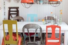 13 an orange chair matches the pendant lamps and some throws on the chairs to make the space harmonious