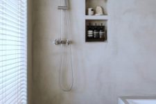 14 a neutral bathroom completely done with concrete is a trendy minimalist space