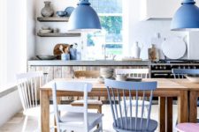 14 pendant lamps are echoing the chair and even some tableware to create a chic beach space