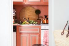 19 coral cabinets with white framing will make your kitchen bold and bright