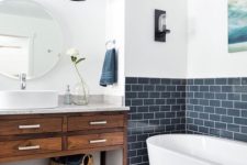 20 a backsplash of navy subway tiles with white grout is a refreshing and modern idea for a bathroom