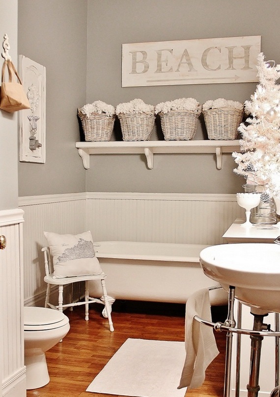 a single Christmas tree in white with lights and ornaments sticks to the decor theme and brings holiday vibes