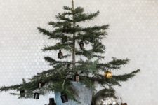 22 a tray with a large tree in a galvanized bucket, vintage ornaments and an oversized one