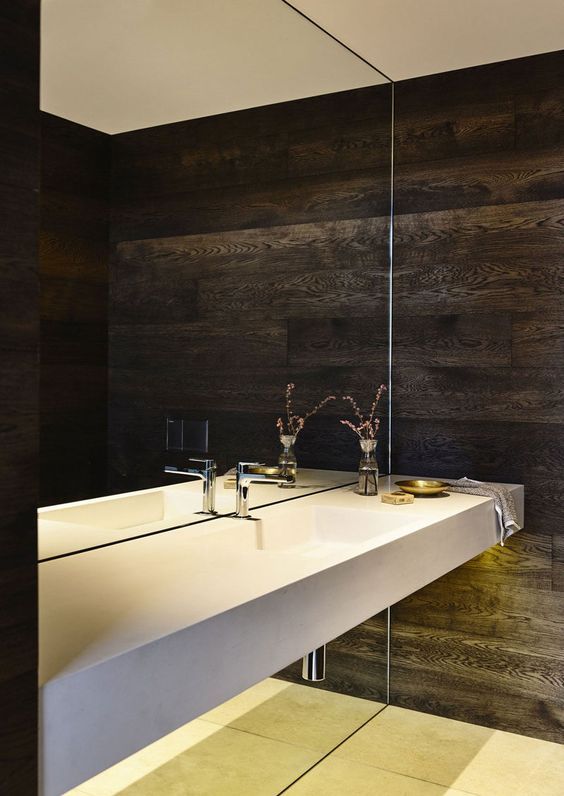 a whole mirror wall is a bold statement for a minimalist or modern bathroom, it will make the space look larger a whole mirror wall is a bold statement for a minimalist or modern bathroom, it will make the space look larger