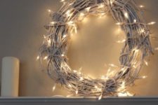 24 a white vine Christmas wreath with lights is a cool and simple DIY idea for holidays, it won’t take much time to make
