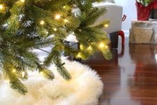 fur is a great way to cover a christmas tree base