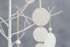 26 white clay Christmas ornaments with little jingle bells are a very cool decor and gift idea