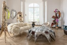 01 This unique coffee table wows, it’s a gorgeous design with large rhinestones that is inspired by a sea creature