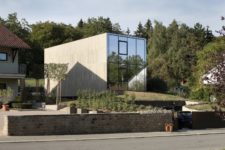 01 This unusual and monolith looking house features minimalist and even brutalist aesthetic