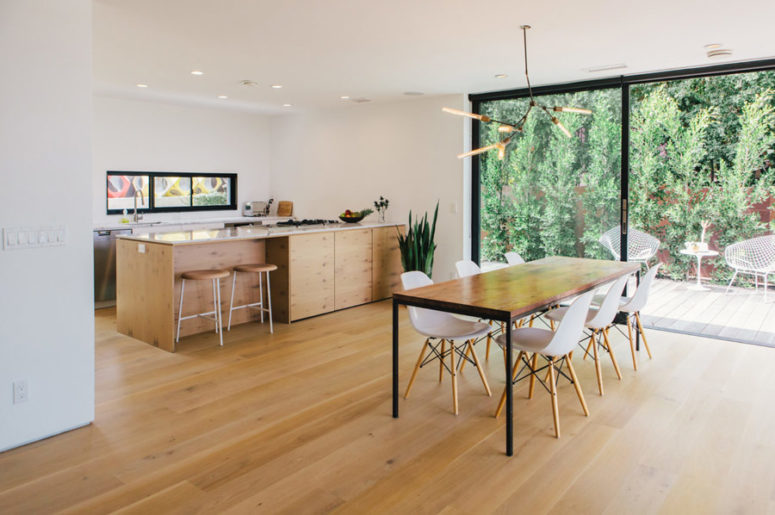 This welcoming and inviting family home was renovated by the owner himself for his family and features stylish minimalism and lots of natural light