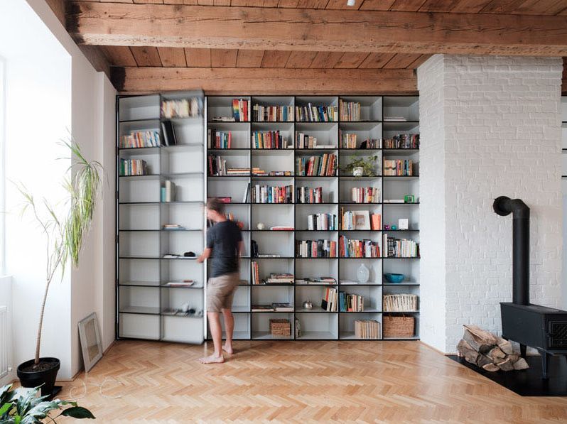 The door to the bedroom is hidden inside the bookcase, which is a smart idea to rock