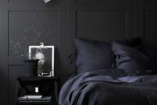 02 a moody bedroom with black bedding is a comfortable sleeping oasis for any winter