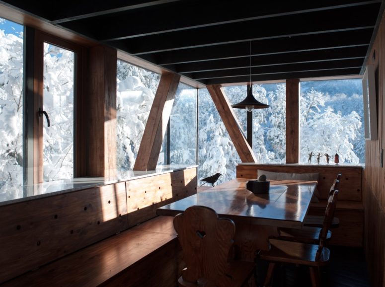 The dining space is fully of wood and there are non framed windows to catch the views while eating here The dining space is fully of wood and there are non-framed windows to catch the views while eating here