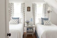 03 a chic vintage bedroom with two beds, two windows, much pattern and neutral for a soothing feel