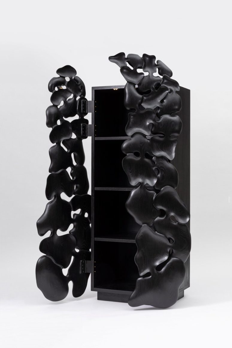 Such fluid-looking cabinet doors are amazing and they turn furniture into art objects