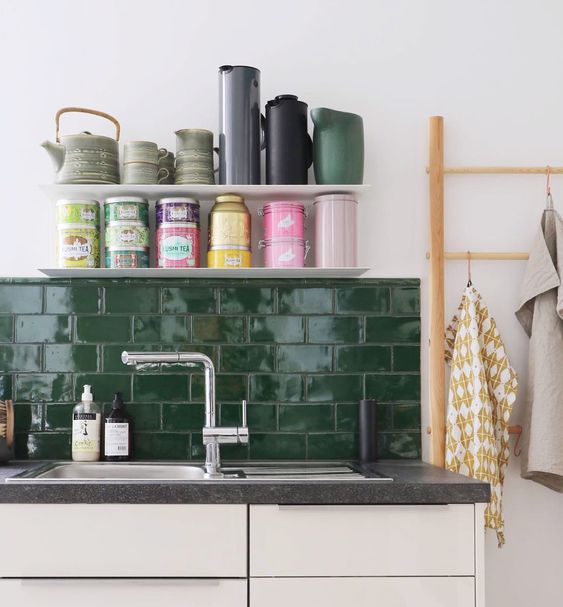 dark green tiles may refresh and update your neutral kitchen look or add color to a moody space