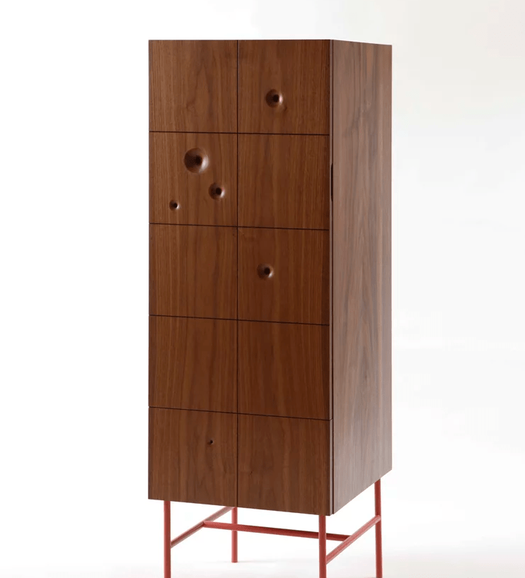 There's also a tall cabinet with several wormhole