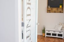 06 a frosted glass laundry door with letters is a cool and fresh idea to try for a modern home