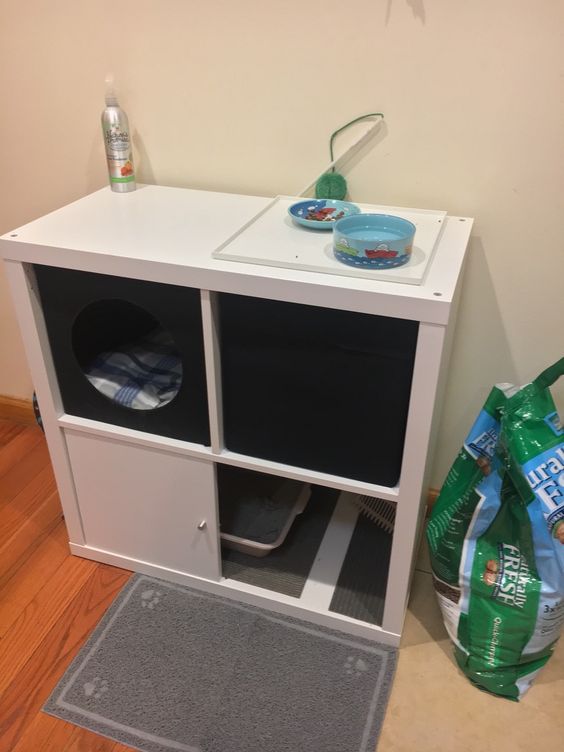 a cozy corner for your cat with Drona boxes cut out to let the kitty come in