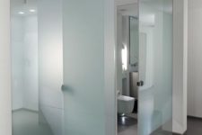 07 a powder room all clad with frosted glass is a very contemporary and fresh idea for a minimalist space