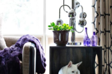07 a stylish and whimsy coffee table with a built-in dog bed gives your pet a personal space in your room