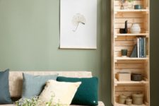 08 a modern bookshelf composed of IKEA Knagglig boxes and placed on legs is a cute and easy DIY