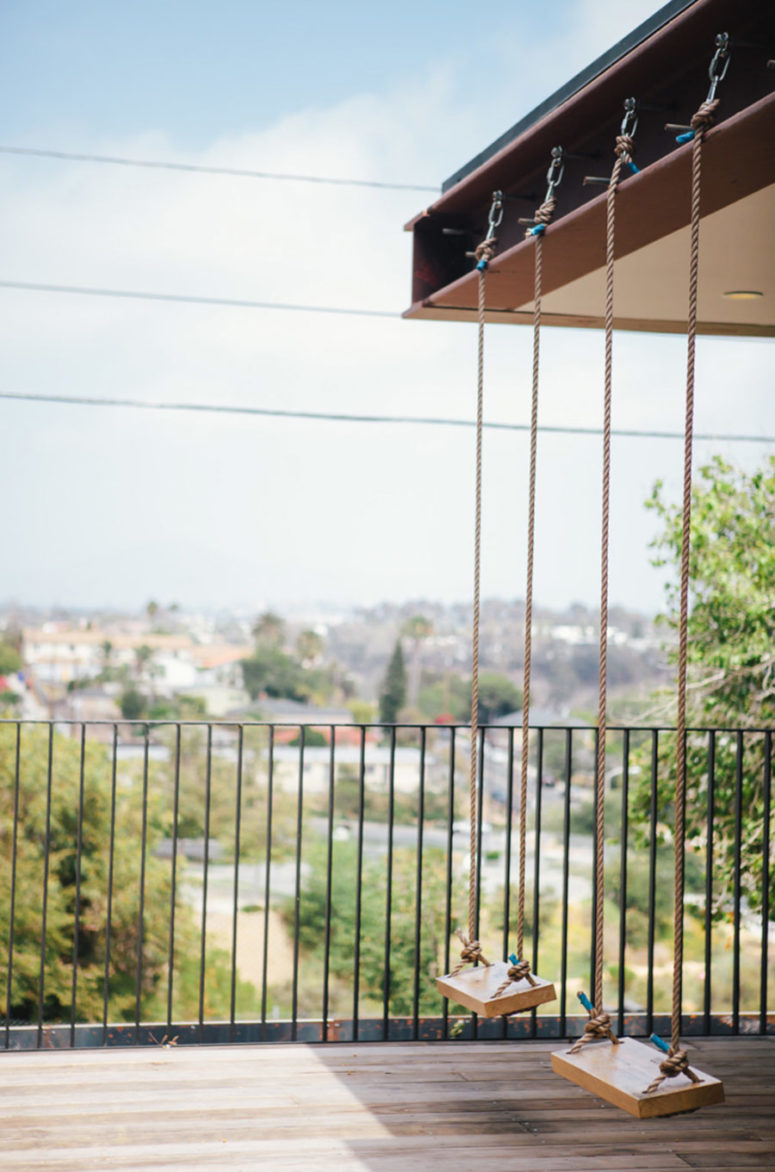 Swings are hung for the kids