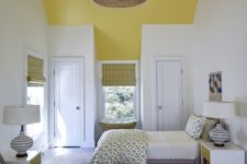 13 a lively twin guest bedroom with sunny yellow touches, printed textiles and several windows