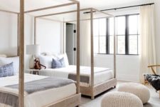 14 a modern beach twin guest bedroom with canopy beds, knit ottomans and much natural light